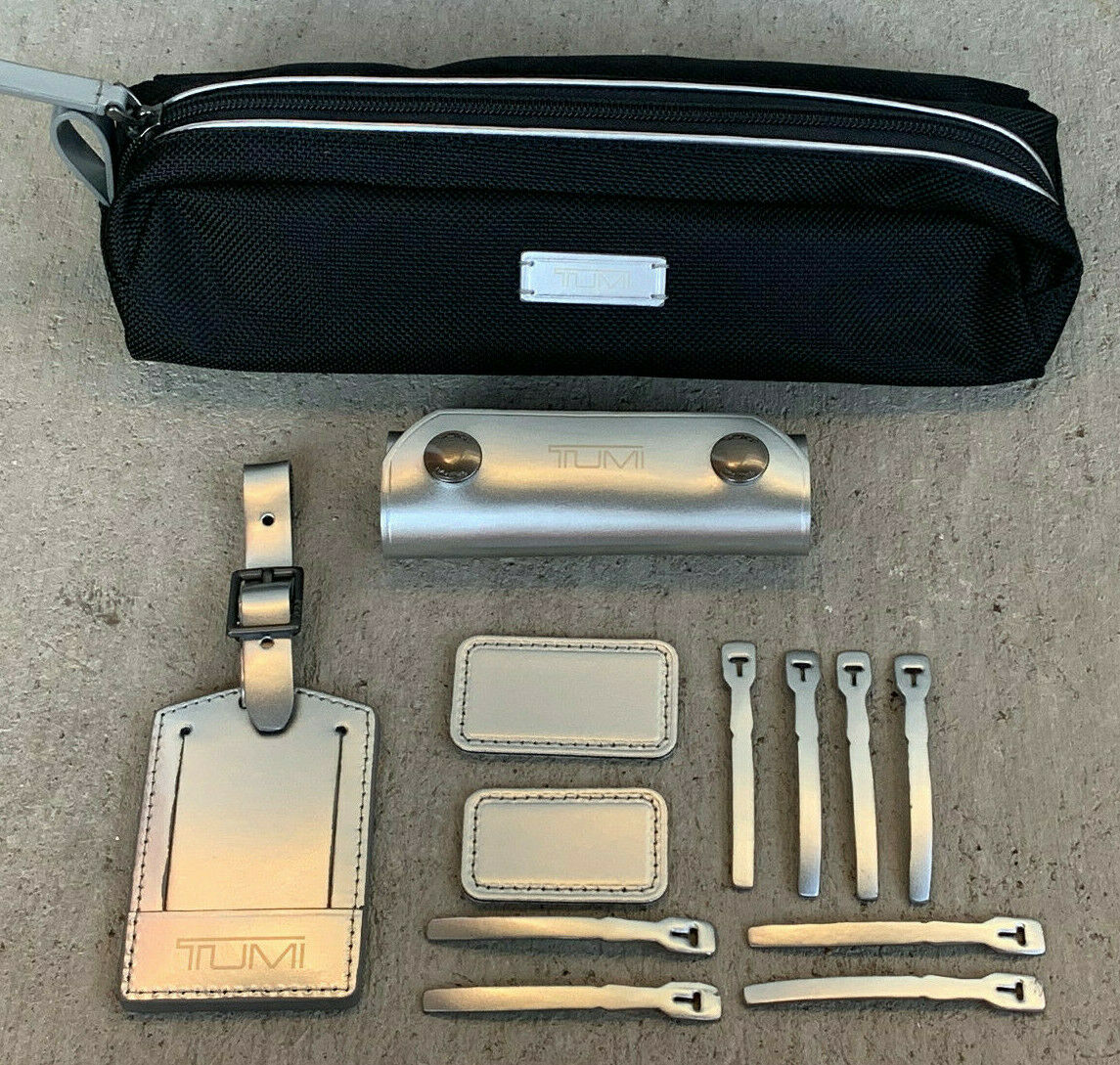 New Tumi Accents Kit In Metallic Silver Zipper Pull Patch And Tag Rare $115 Msrp